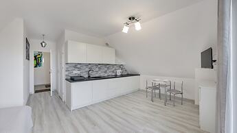 Apartamenty Sun & Snow Zasypane Mazury