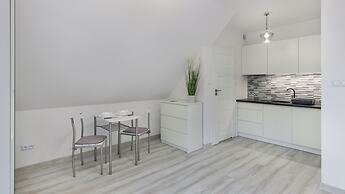 Apartamenty Sun & Snow Zasypane Mazury