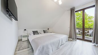 Apartamenty Sun & Snow Zasypane Mazury