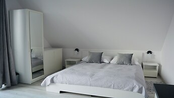 Apartamenty Sun & Snow Zasypane Mazury
