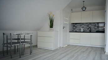 Apartamenty Sun & Snow Zasypane Mazury