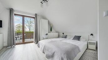 Apartamenty Sun & Snow Zasypane Mazury