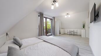 Apartamenty Sun & Snow Zasypane Mazury