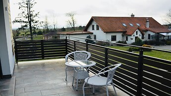 Apartamenty Sun & Snow Zasypane Mazury