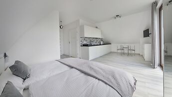 Apartamenty Sun & Snow Zasypane Mazury