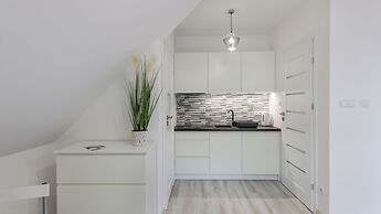 Apartamenty Sun & Snow Zasypane Mazury