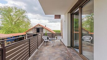 Apartamenty Sun & Snow Zasypane Mazury