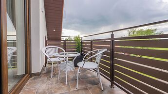 Apartamenty Sun & Snow Zasypane Mazury