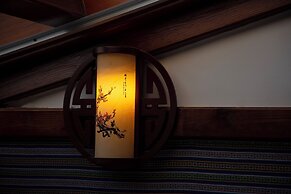 Zhangjiajie Xinghe Qingmeng Folk-style Inn