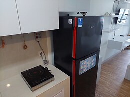 Warm and Cozy Studio at Springwood Residence Tangerang Apartment