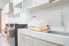 Cozy Studio Apartment with Super Single Bed at Springwood Residence