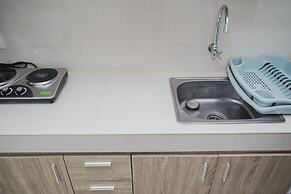 Homey Studio Apartment Springwood Residence