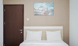 Comfortable 1BR Apartment at Springwood Residence