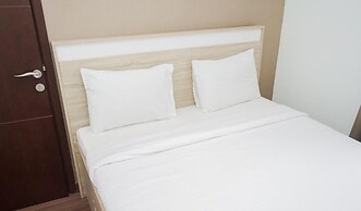 Comfortable 1BR Apartment at Springwood Residence