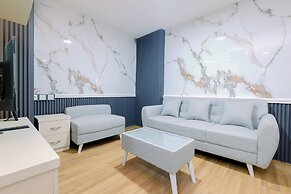 Restful and Modern 2BR at Sentul Tower Apartment