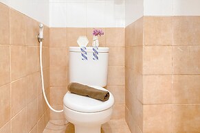 Warm and Well Designed Studio Room at Green Pramuka City Apartment