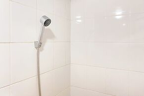 Warm and Well Designed Studio Room at Green Pramuka City Apartment