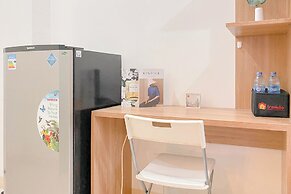 Warm and Well Designed Studio Room at Green Pramuka City Apartment