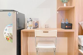 Warm and Well Designed Studio Room at Green Pramuka City Apartment