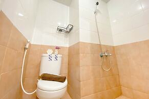 Warm and Well Designed Studio Room at Green Pramuka City Apartment