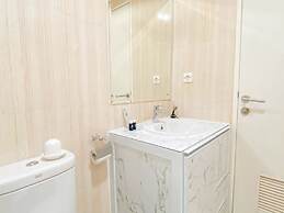 Warm and Cozy 1BR without Living Room at Sentul Tower Apartment