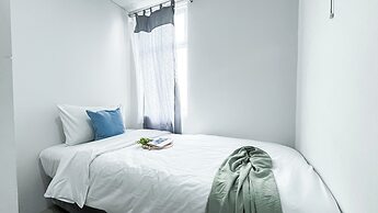 Homey 2BR Apartment with Space Room at Vittoria Residence