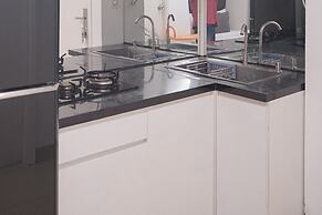 Comfortable and Warm Studio at Poris 88 Apartment