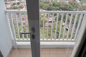 Comfortable and Warm Studio at Poris 88 Apartment