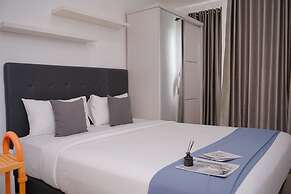 Comfortable and Warm Studio at Poris 88 Apartment