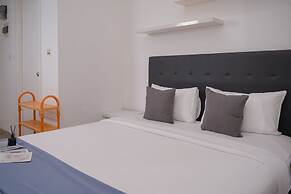 Comfortable and Warm Studio at Poris 88 Apartment