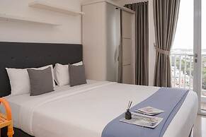 Comfortable and Warm Studio at Poris 88 Apartment