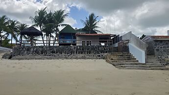 Serrmabi Pé na Areia by La Playa