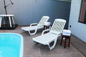 Casa Central piscina e AC para 8 hospede