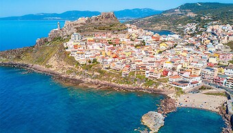 Large Seaside Apartment With Patio in Lu Bagnu