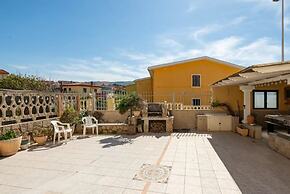 Large Seaside Apartment With Patio in Lu Bagnu