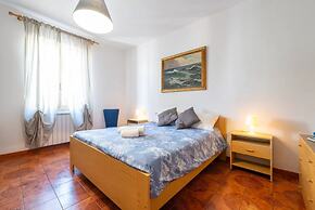 Large Seaside Apartment With Patio in Lu Bagnu