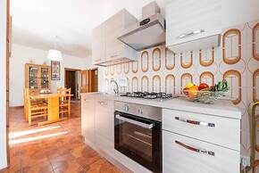 Large Seaside Apartment With Patio in Lu Bagnu