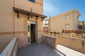 Large Seaside Apartment With Patio in Lu Bagnu