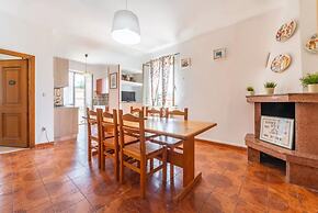 Large Seaside Apartment With Patio in Lu Bagnu