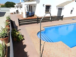 Apartamentos piscina compartida