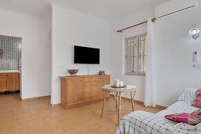 Apartamentos piscina compartida
