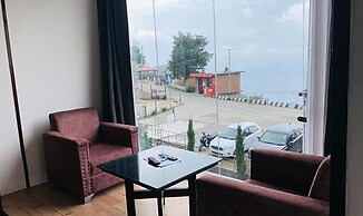 Fabhotel Burans Residency