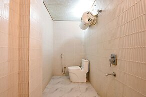 Fabhotel Lazeeno