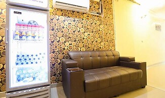Fabhotel Lazeeno
