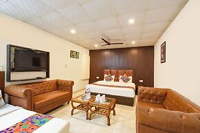 Fabhotel Lazeeno