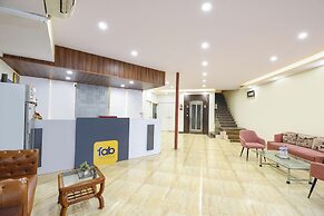 Fabhotel Lazeeno