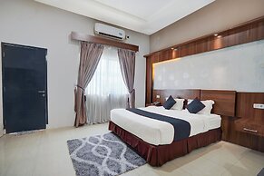 Capital O 94619 Bunda Hotel