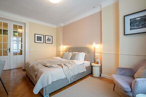 Elegant 3BR Flat Steps From Romanian Athenaeum