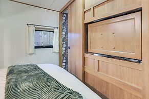 7 Mi to Torch Lake: Pet-friendly Getaway!