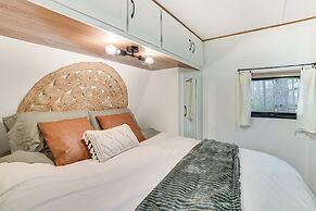 7 Mi to Torch Lake: Pet-friendly Getaway!